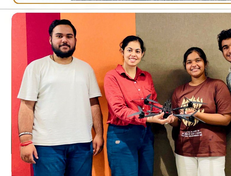 Durgastra founding team holding the Vajra fiber-optic drone